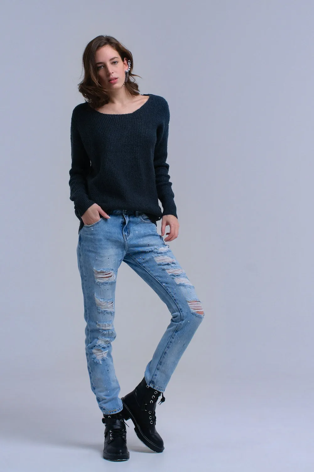 Green knitted sweater with tie-back closure